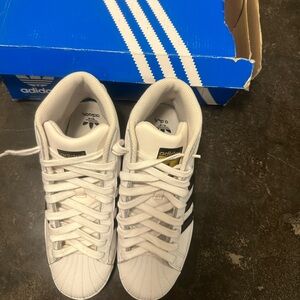 Junior size(4. 5) Adidas High Top.